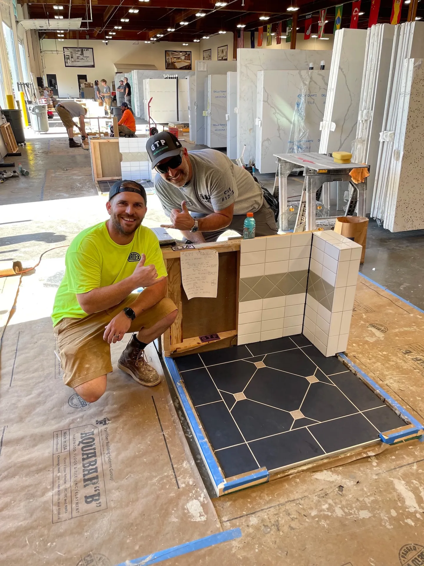 Custom floor and wall tile design inside professional stone and quartz fabrication workshop